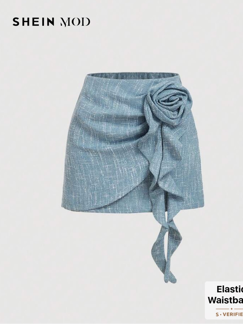 Elegant Blue Textured Skirt with Floral Detail